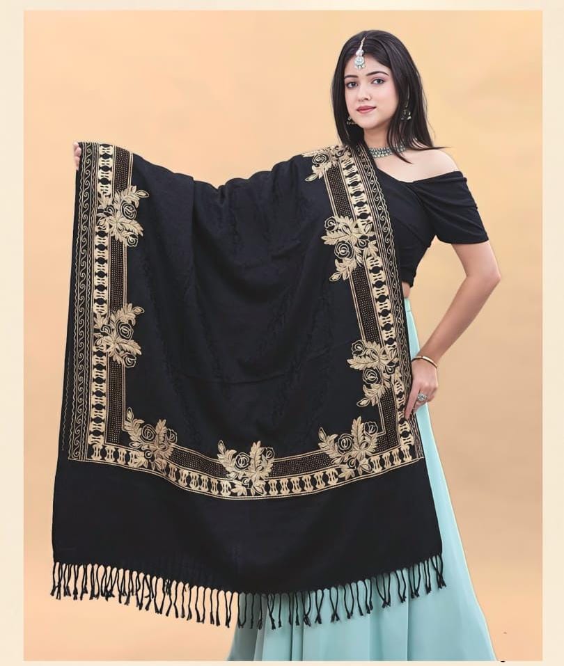 Black embroidered suit with gold floral vine border
